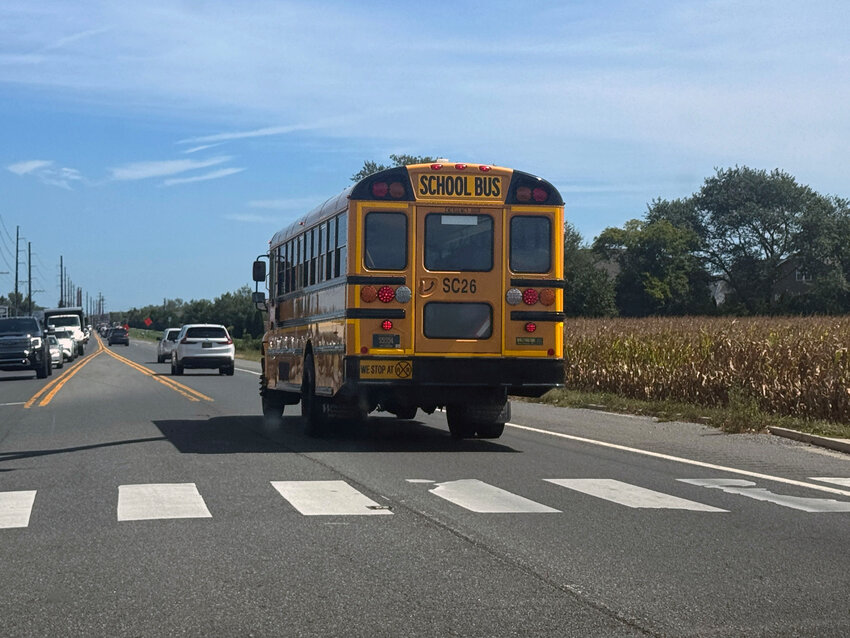 School buses like this one on U.S. 9 in Lewes are filling the roads now that kids are back to school.