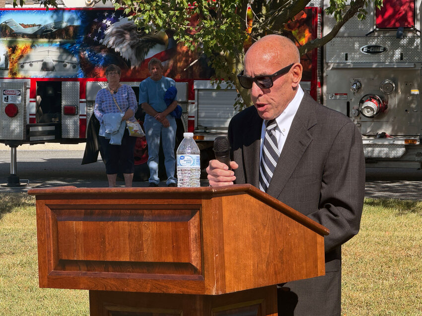 William Raff, a survivor of the World Trade Center 9/11 attack, speaks at the Air Mobility Command Museum on Wednesday.