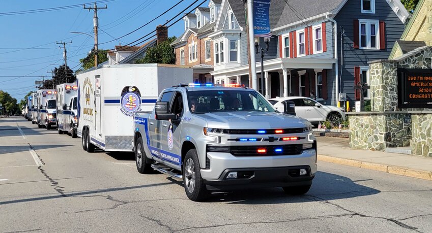 American Legion Ambulance Station 64 vehicles travel on West Commerce Street during Saturday's parade through Smyrna.