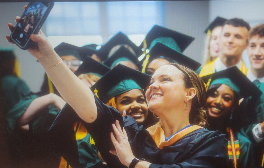 There's time for a selfie with classmates.