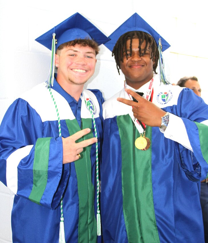 Pictured, from left, are Rusty Lloyd and Nasir Batson, part of the St. Georges Technical High School class of 2026 that was honored during a May 28 graduation ceremony at the University of Delaware's Bob Carpenter Center in Newark.