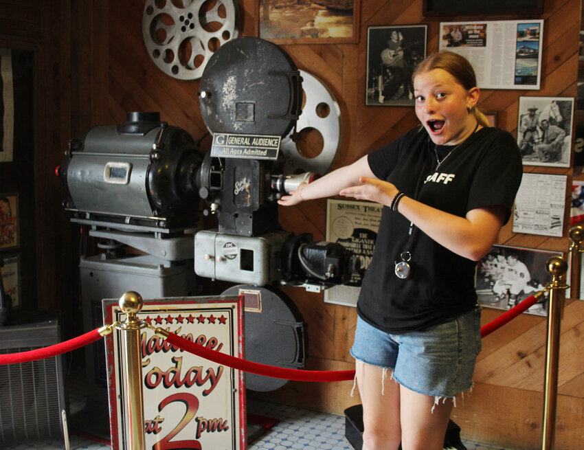 Aphtin Redding served as tour guide, visitor counter and concession volunteer during the Saturday, June 27 open house at the former Ball Theatre. The 214 East Main Street property, now the Millstone, is owned by Redding's grandparents, Eric Clarke and Julie Hattier.