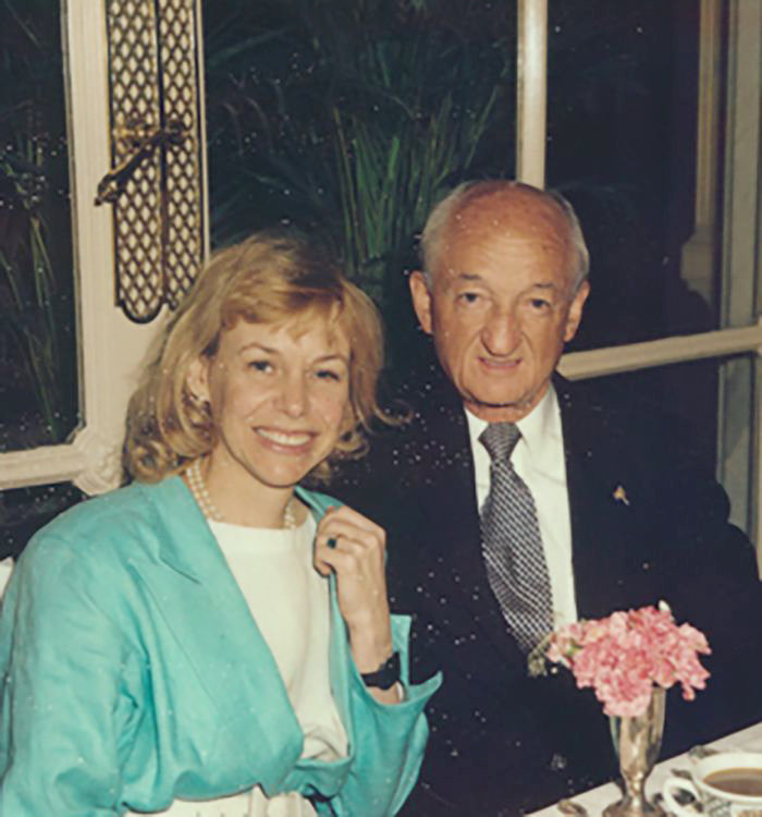 On their engagement, Mitzi Perdue displays the emerald ring given to her by Frank Perdue, right.
