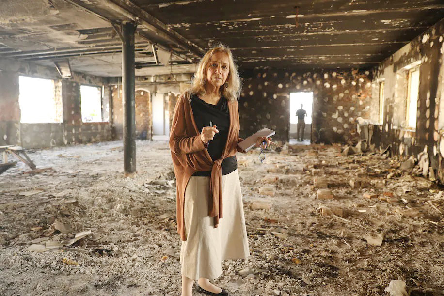 Mitzi Perdue inside a bombed police station near Ukraine's border with Belarus in August.