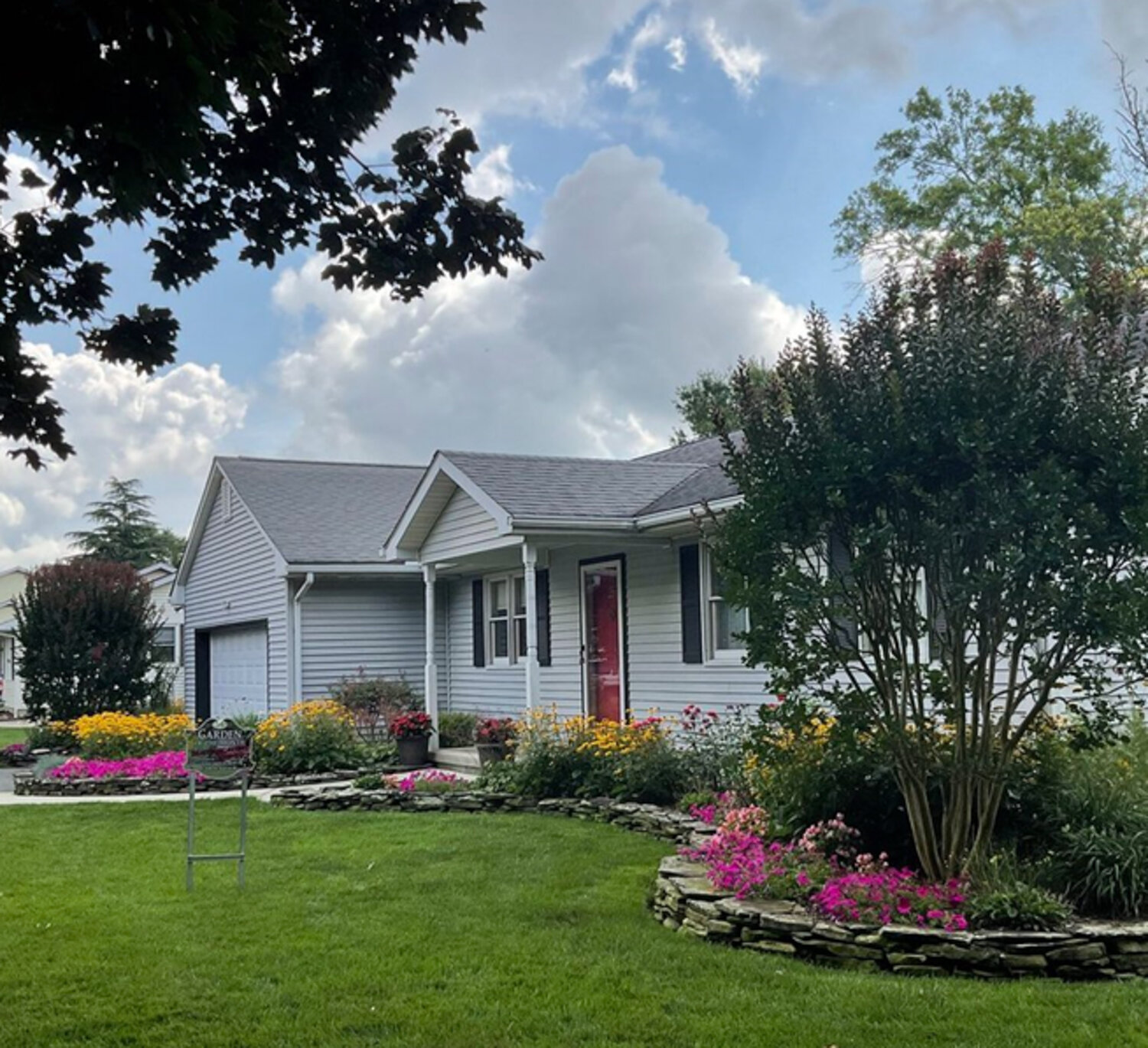 Steve and Toni Zeveney’s garden at 58 Valley Forge Drive in Shawnee Acres, is full of “perfectly placed” flowers of a variety of colors, the Milford Garden Club wrote of their pick for July garden of the month.