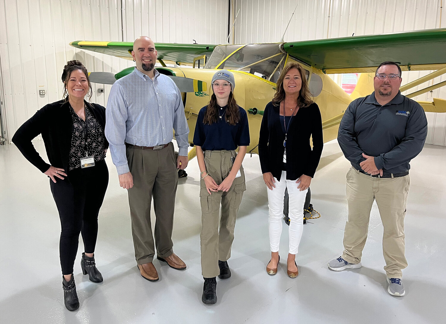 From left, Michelle Susi, Summit Aviation, Joe Olivere, Delaware Department of Labor, Abby Holloway, Lynn Trent, Summit Aviation and John Morris, Polytech School of Aviation Maintenance.