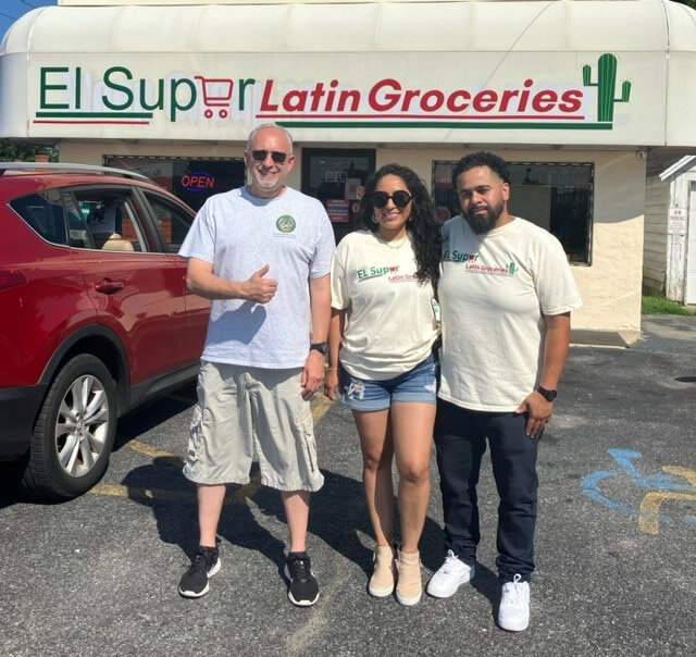 From left, Dover City Councilman Brian Lewis and EL Super Latin Groceries owners Crystal and Josue Mayorga.
