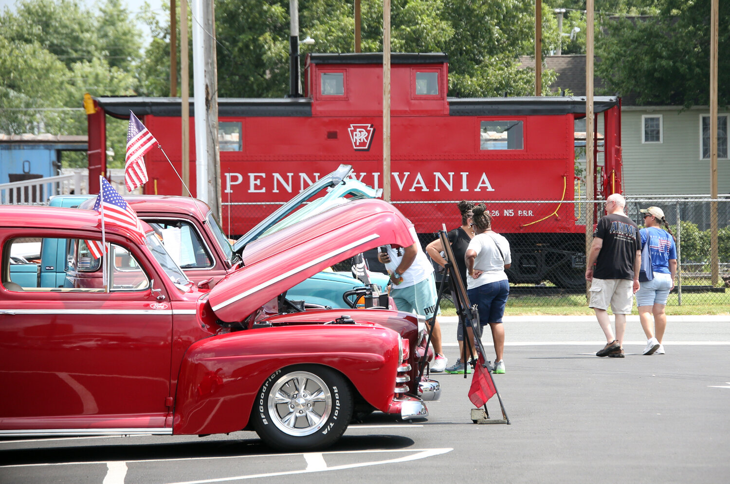 Across the street from the Harrington Historical Society's caboose, car enthusiasts enjoyed a show of classic cars in the M&T Bank parking lot Saturday at Heritage Day.