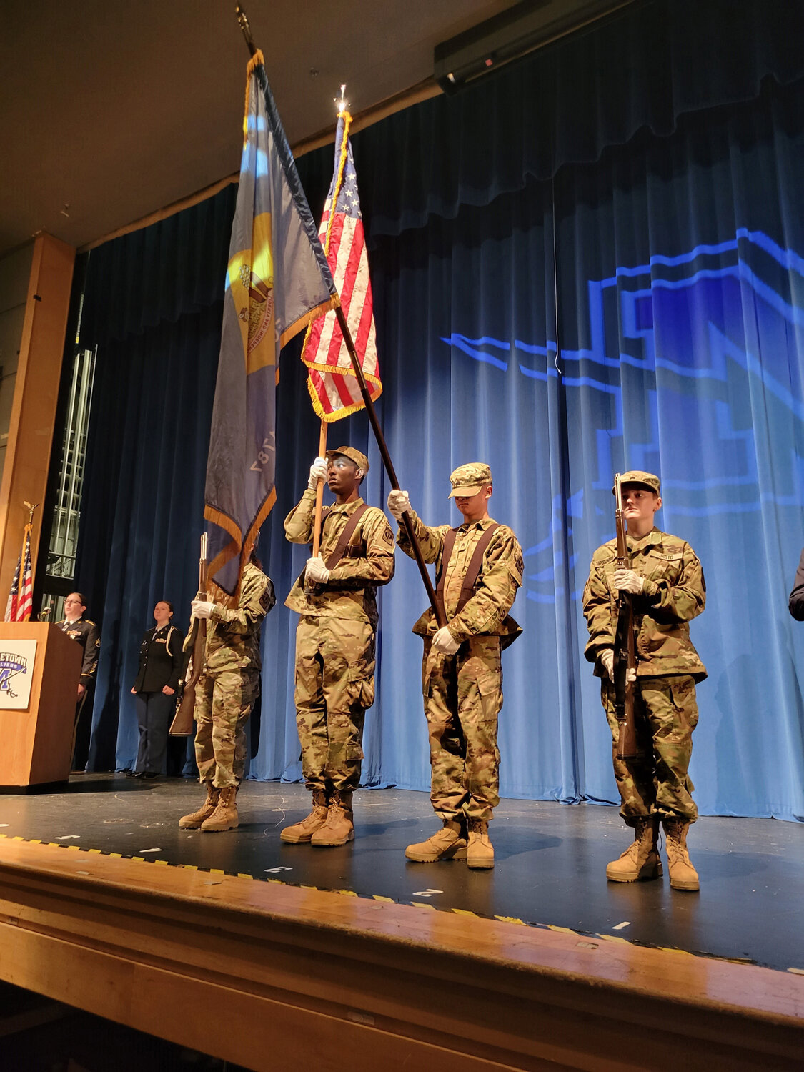 Appoquinimink High Army Junior ROTC cadets present the United States and Delaware flags during the Patriot Day Ceremony held in remembrance of 9/11 at Middletown High Monday.
