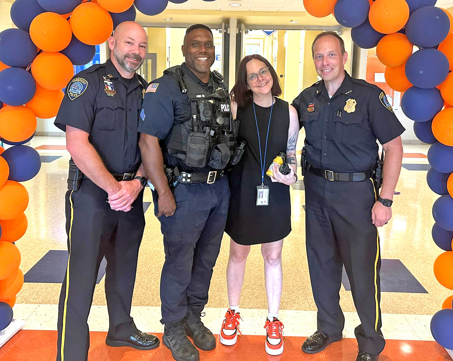 On Sept. 6, Cambridge Police Chief Justin Todd and Captain Shane Hinson wished Corporal Joe Jones good luck, as he began his duties as the new Mace’s Lane Middle School Resource Officer. From the left are Capt. Hinson, Cpl. Jones, Principal Patricia Prosser, and Chief Todd.