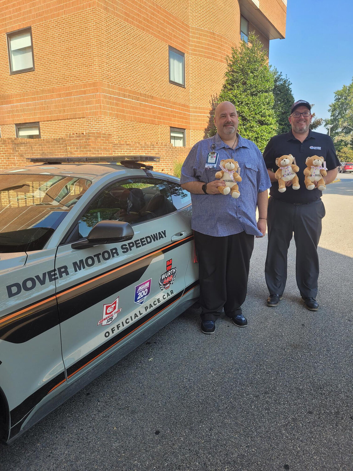 Dennis S. Hallock Sr., business operations manager for Bayhealth emergency departments left, and Michael Lewis, manager of communications for Dover Motor Speedway.