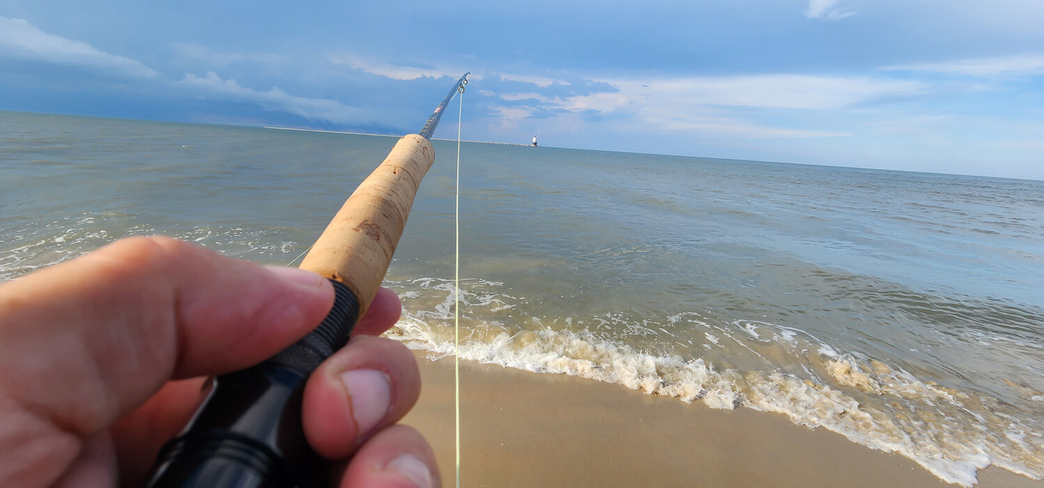 I was fly casting The Point along the sand ledge of the bay side toward the ocean side, picking up small bluefish. It's much easier with only a slight breeze at your back.