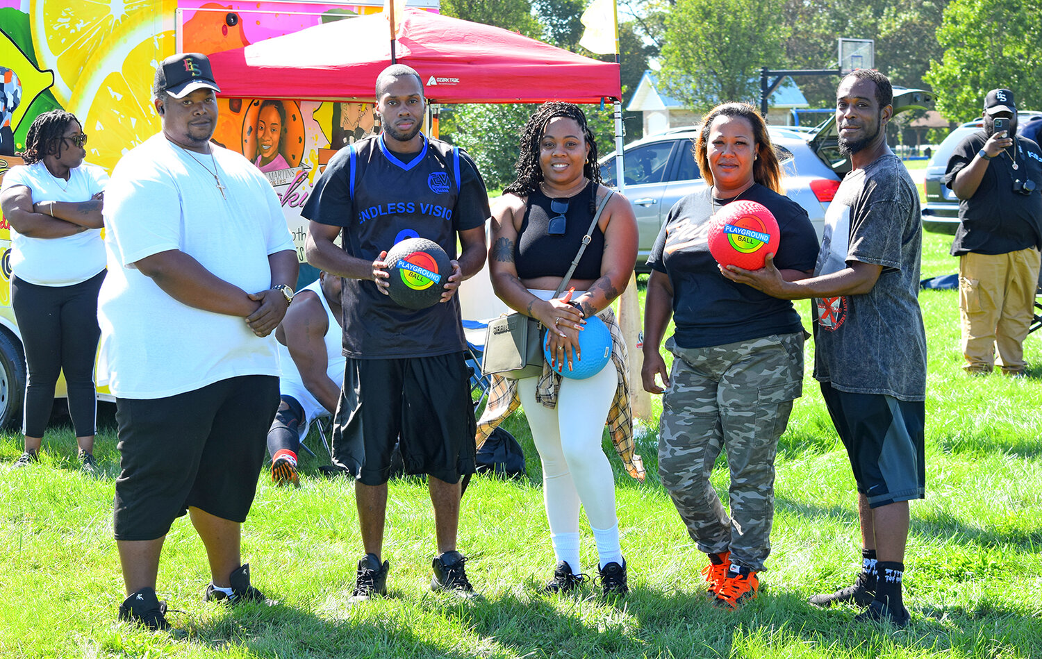 A friendly Cambridge vs. Easton kickball game got underway in the Talbot town early Sunday afternoon. The event was planned as  a way to bring the two communities together. Organizers were, from the left, DJ Marshall Bradley, Bobby Johnson, Teasha Macer, Tyzann Meekins and Davontae Baker.