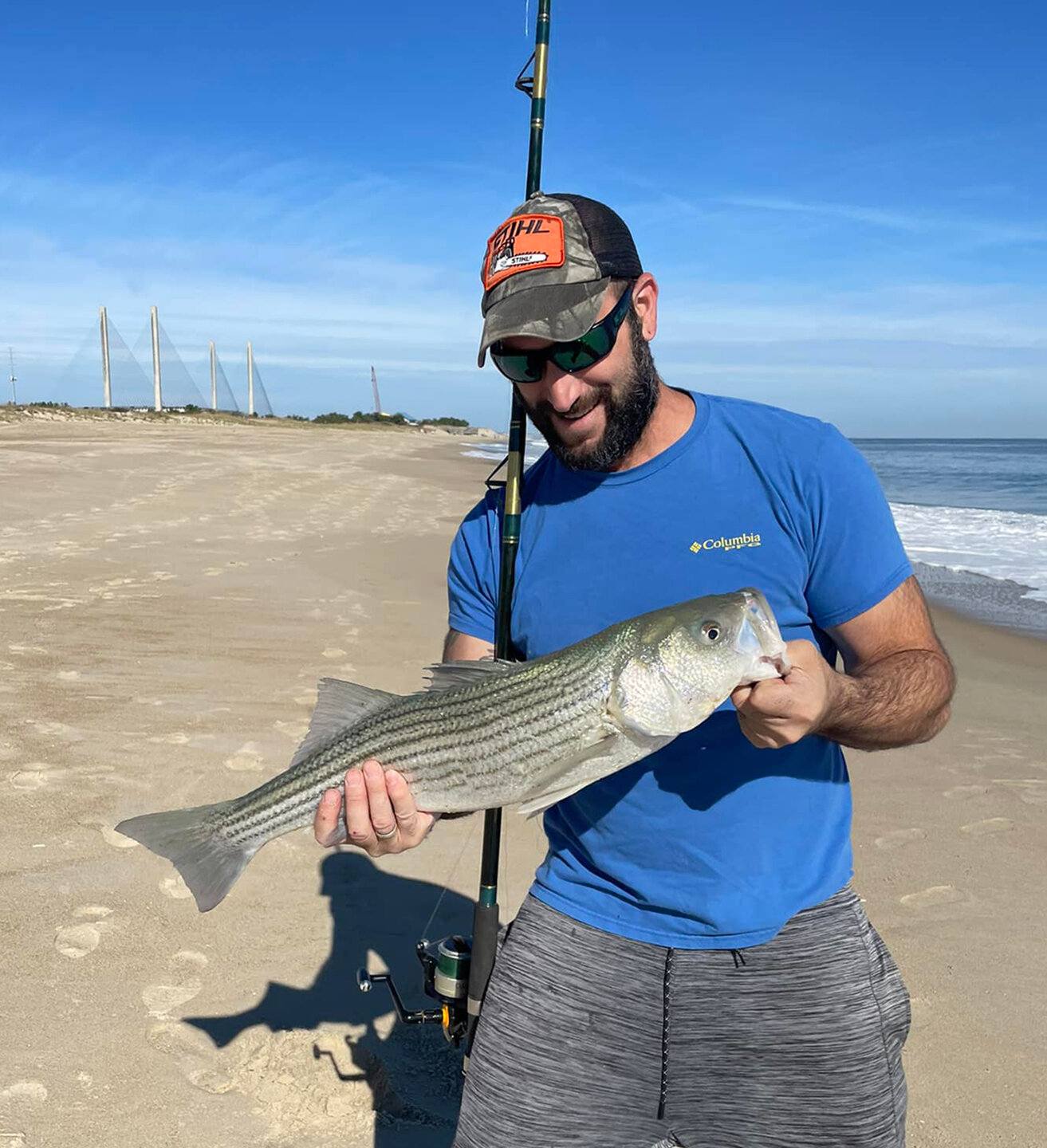 Spencer Unger with a nice short striped bass caught at 3R's in Delaware Seashore State Park.