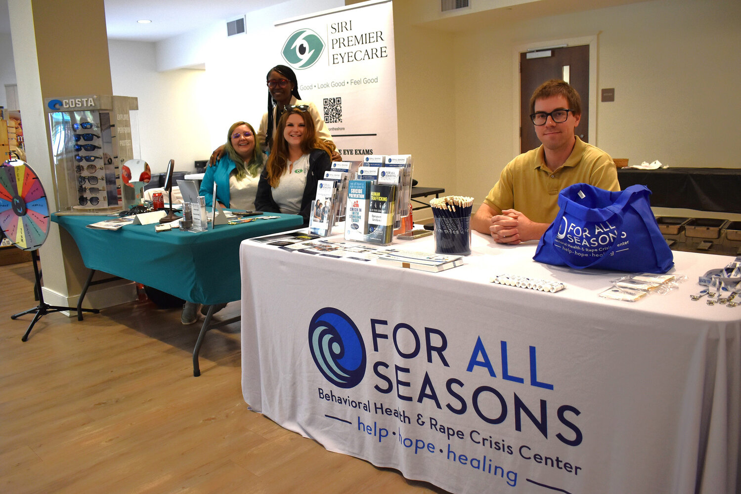 Siri Premier Eyecare and For All Seasons were neighbors at Thrive Dorchester 2023, hosted by the Dorchester Banner at the Weinberg Intergenerational Center.