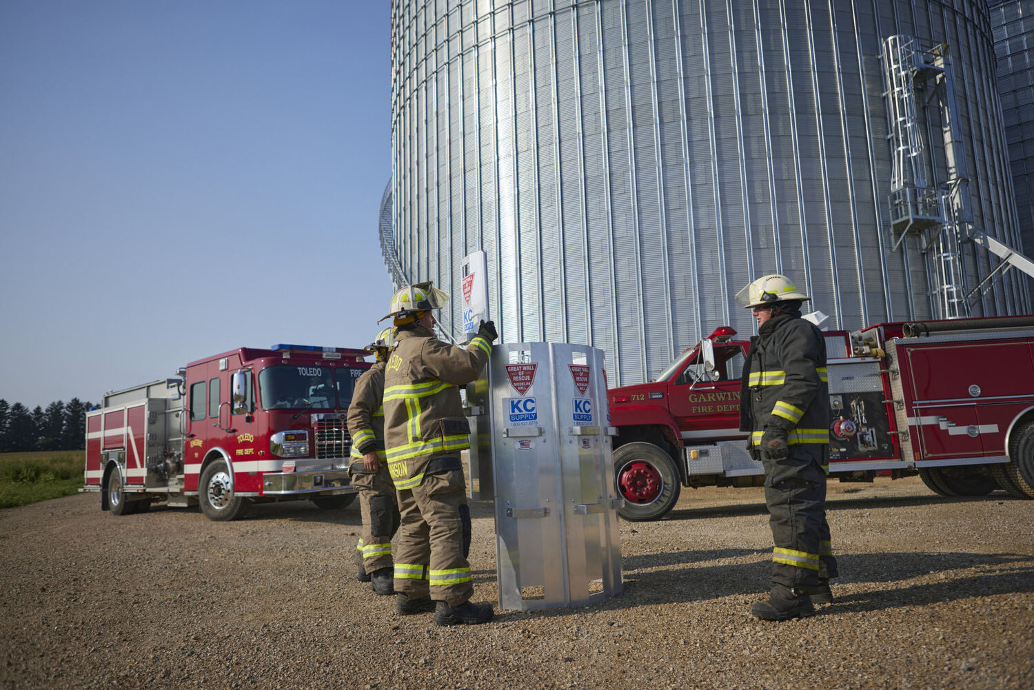 Firefighters from Garwin and Toledo (Iowa) fire departments work with a grain rescue tube similar to what select fire departments in Somerset, Dorchester and Talbot counties received through Nationwide’ Grain Bin Safety Program.
