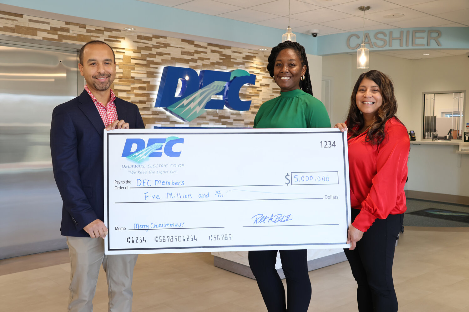 Delaware Electric Cooperative’s COO Dwayne Street, Junior Accounting and Capital Credits Clerk Amber Cannon and Manager of Billing and Capital Credits Ivanessa Cay announce the return of more than $5 million to members.
