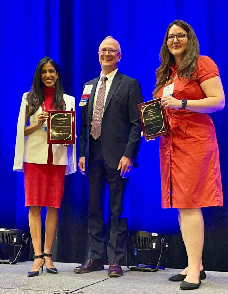Bayhealth physician and Highmark Blue Cross Blue Shield Delaware Family Medicine Residency Program Director Brintha Vasagar, Md, MPH, FAAFP, (left) receives the award from Donald “Raj” Woolever, MD, along with fellow recipient Stephanie L. Ballard, PharmD, BCPS, BCACP, at the Family Medicine Education Consortium FMEC 2023 Annual Meeting in Providence, Rhode Island.