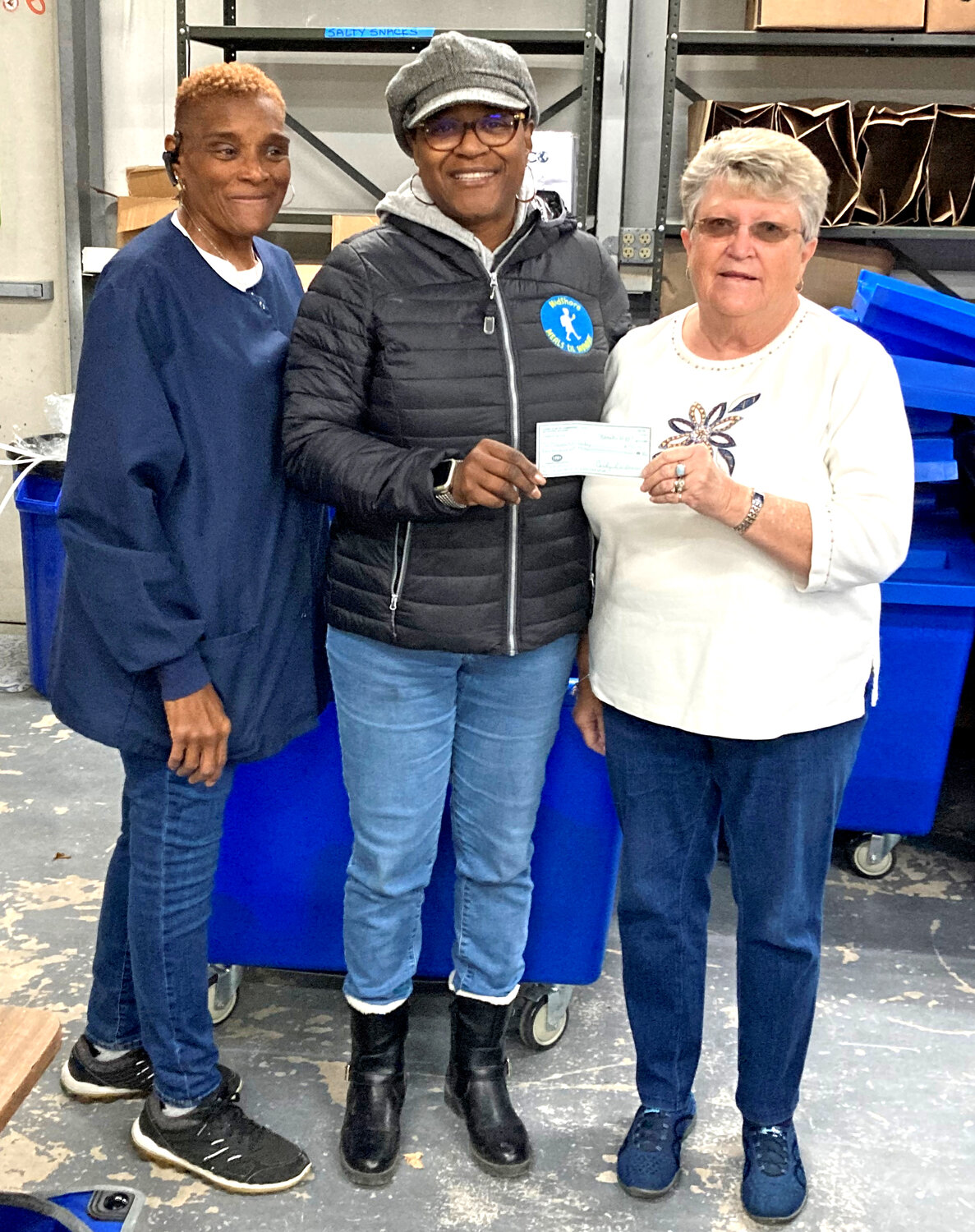 On Nov. 28, Giving Tuesday, Cambridge Lions Club members made a donation to Meals til Monday, a group that provides food to students and their families. From the left are Joyce Green, Pam Allen of Meals til Monday and Treasurer of Cambridge Lions Club Carolyn Williams.