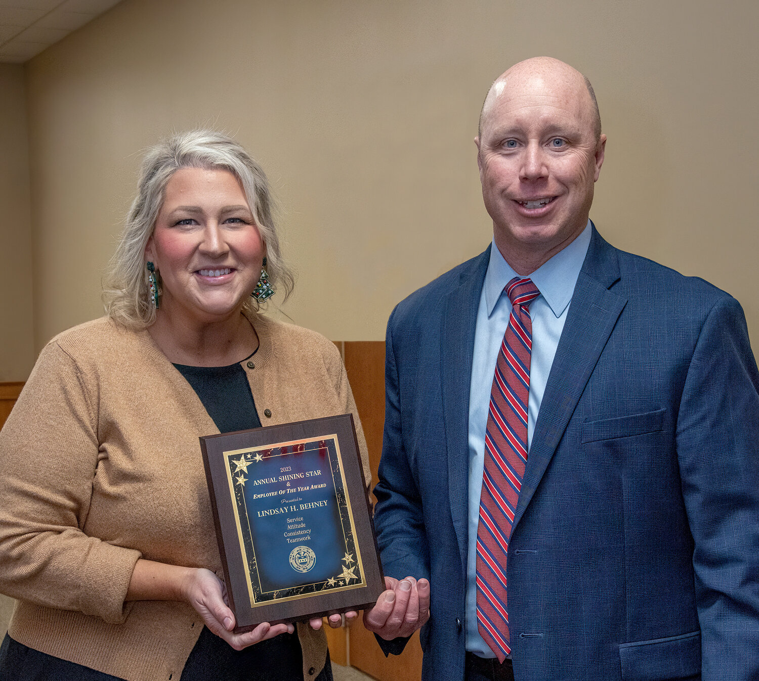 Lindsay Behney, Sussex County's 2023 Employee of the Year, stands with county administrator Todd Lawson.
