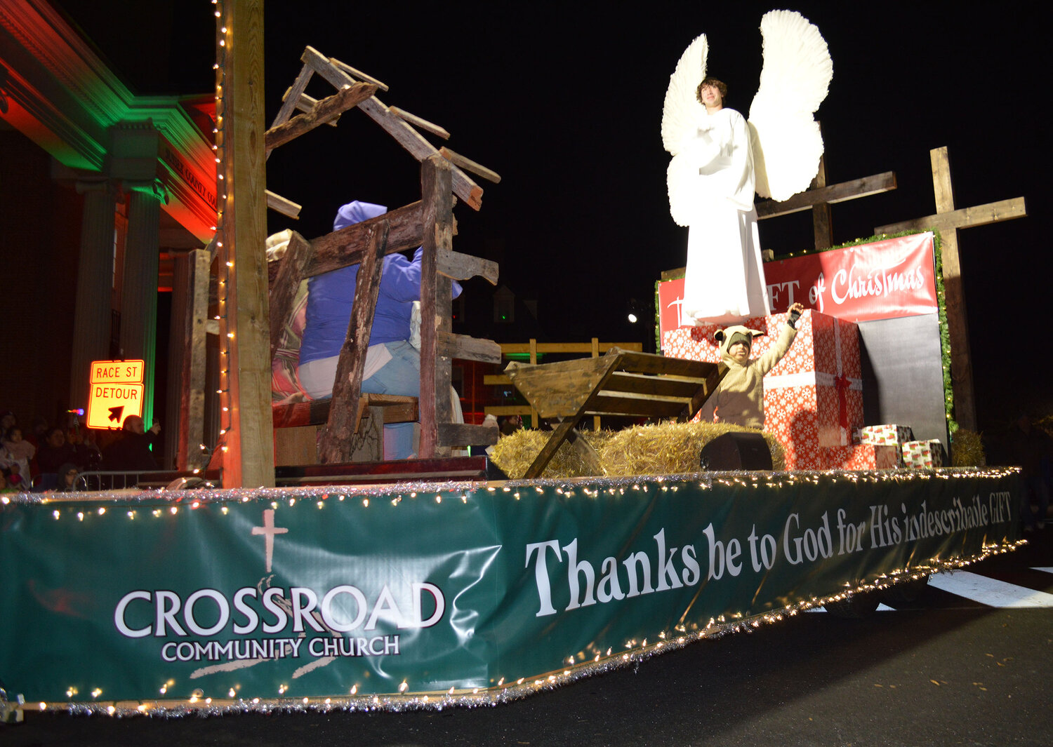 Crossroad Community Church showcases the reason for the season with its entry in the Georgetown Christmas Parade on Thursday.