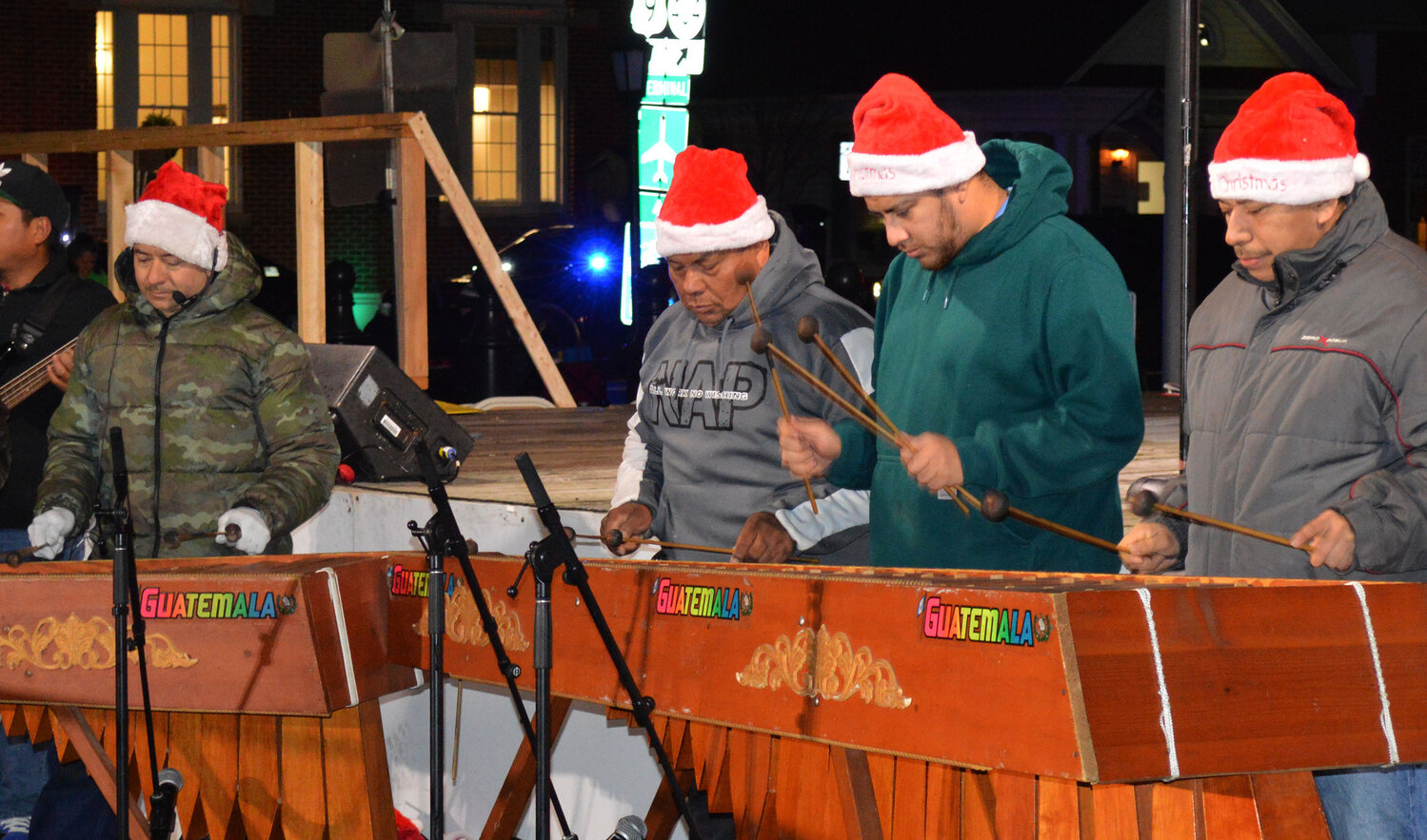Lyra Marquense provides opening music at Caroling on The Circle on Thursday in Georgetown.