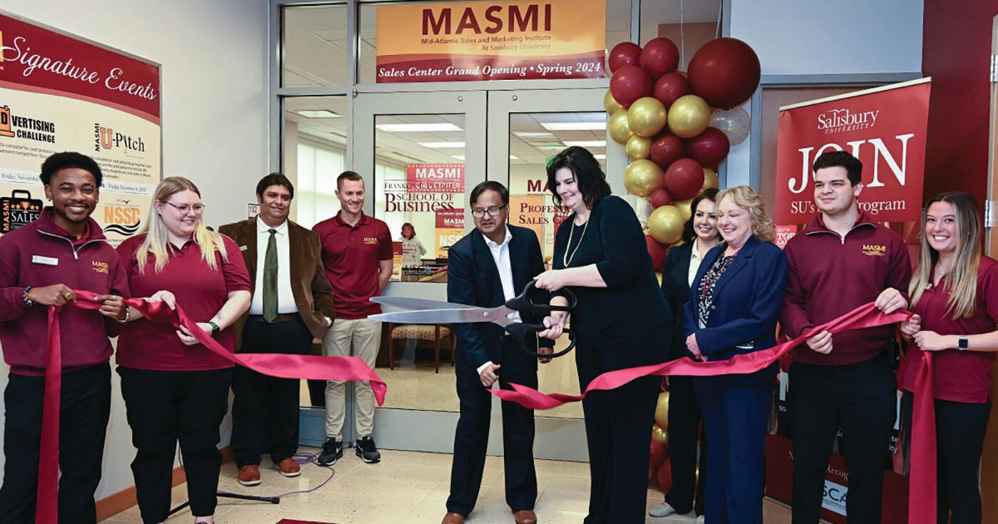 Folks gathered for the Ribbon Cutting Ceremony  to commemorate the grand opening of the Mid-Atlantic Sales and Marketing Institute (MASMI) Professional Sales Center at Salisbury University.