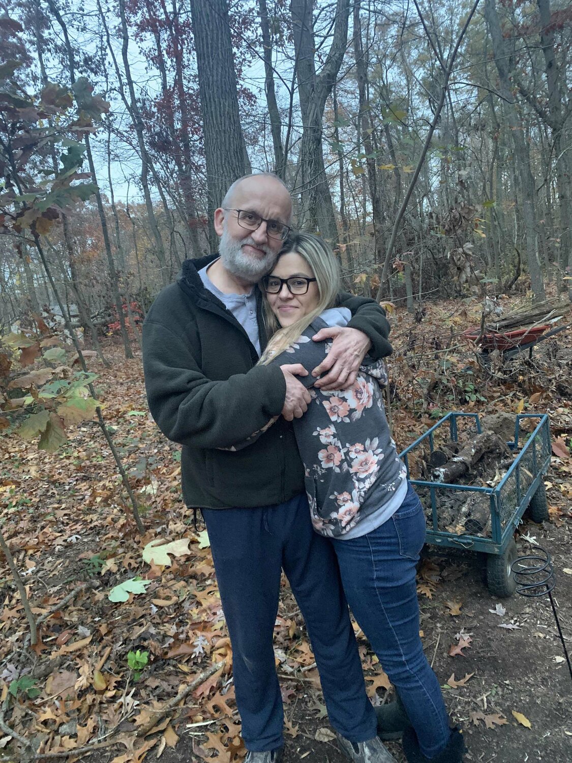 Olivia Fritz embraces her father before his passing in 2022.