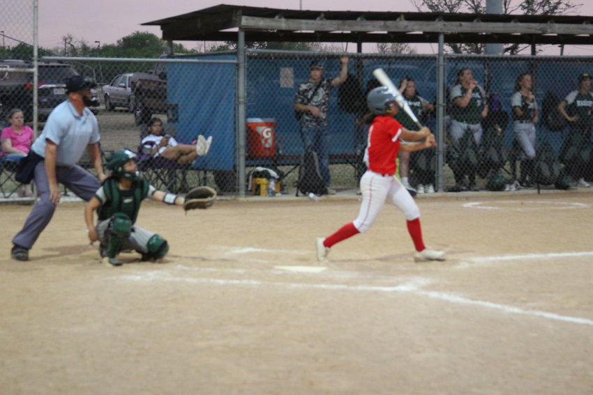 TWO-OUT THUNDER &ndash; Mady Velasquez ties up the game with a two-run blast to right field. Velasquez had two home runs, four RBI and was the winning pitcher in Tuesday night&rsquo;s 13-12 victory over Marion.