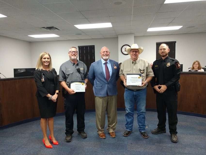 The Gonzales ISD School Board shows their appreciation to the local law enforcement in Gonzales County for their input for the Guardian Program. From Left, GISD&rsquo;s Robin Trojack, Gonzales Police Chief Tim Crow, GISD&rsquo;s Gene Kridler, Gonzales County Sheriff Keith Schmidt and GISD Police Chief Ross Gottwald.