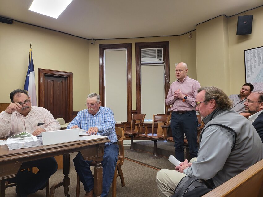 Lew K. Cohn  Jeffrey Wright, vice president of production for Oberon Fuels, explains to Gonzales County commissioners how a proposed anaerobic digester facility will work on land near Cal-Maine Foods in Waelder. The plant will turn poultry waste into renewable fuels and fertilizer.