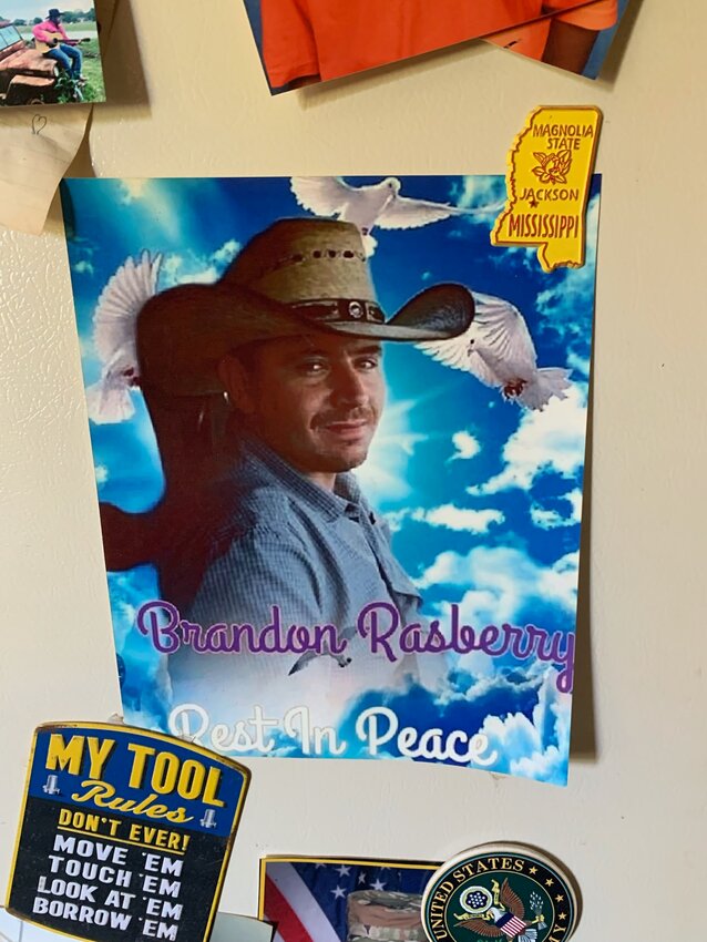 This photo of Brandon Rasberry stays on Laura Fontenot&rsquo;s refrigerator as a constant reminder of her beloved nephew and the promise she made not to stop looking for his killer.