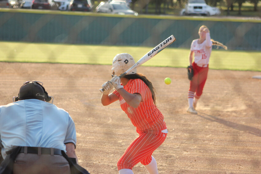 Senior pitcher Haley Cantu (4) at bat for the Lady Apaches in a pre-playoff warmup game against the Shiner St. Paul Cardinals.