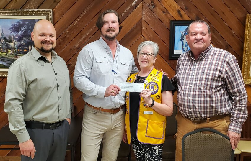 Pictured from left to right are Jason Fogle (Gonzales Noon Lions Club member and GADC Board Member), Josh Gray (GADC Board Treasurer), Cindy Rodriguez (Gonzales Noon Lions Club Foundation President) and David Lindeman (GADC Board President).