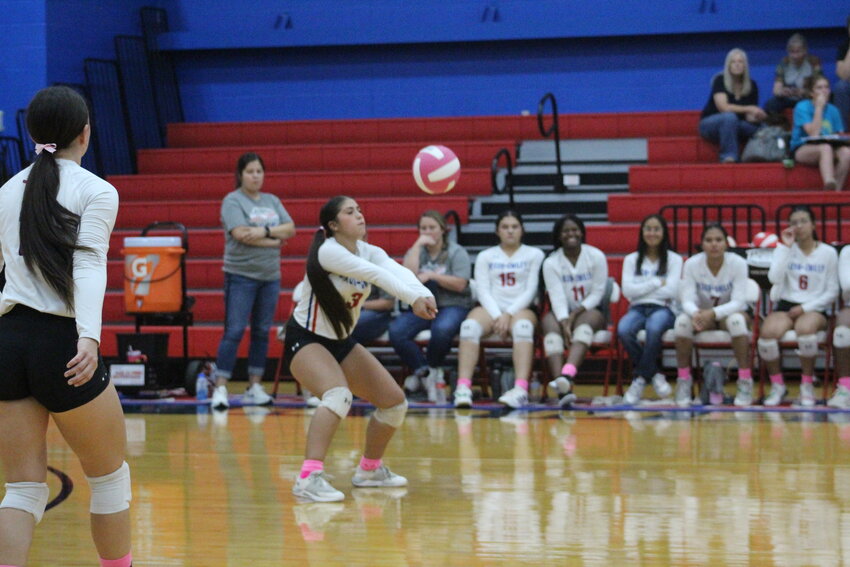 Lady Mustangs Marysol Granados receives a serve by Poth in the district match Tuesday, Oct. 15.