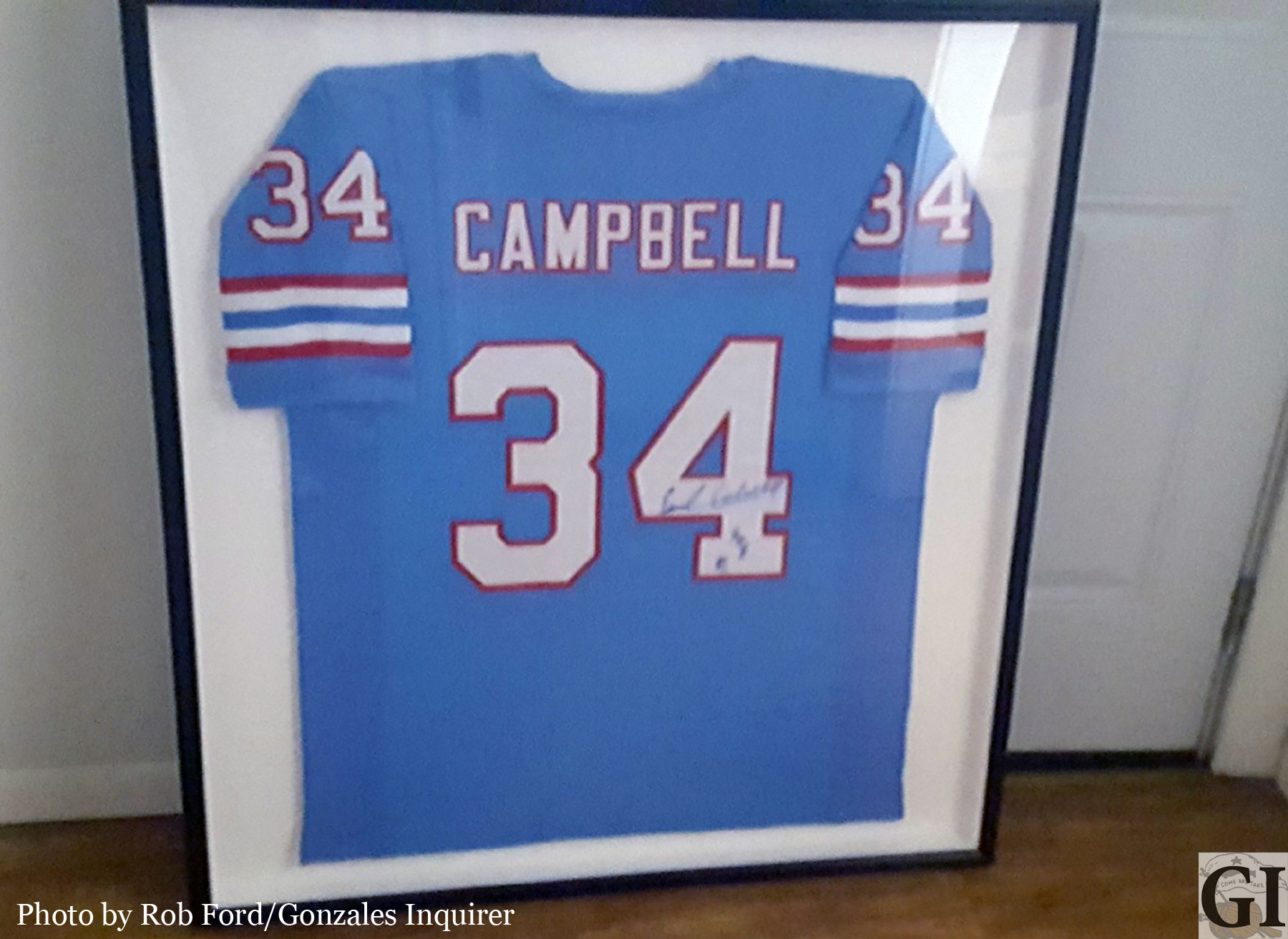 Carolyn Billings won this signed Earl Campbell jersey in the Gonzales Raffle Benefitting Silent Santa. She donated it to the Leesville County Fair auction in memory of Mark Billings.