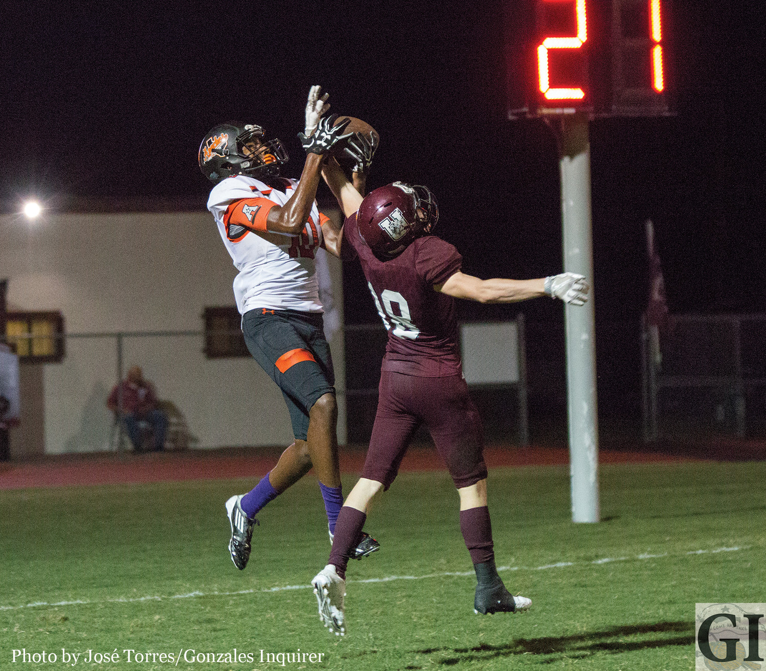 Trevion McNeil (10) snags a touchdown pass in the end zone during the Apaches’ 34-20 win.