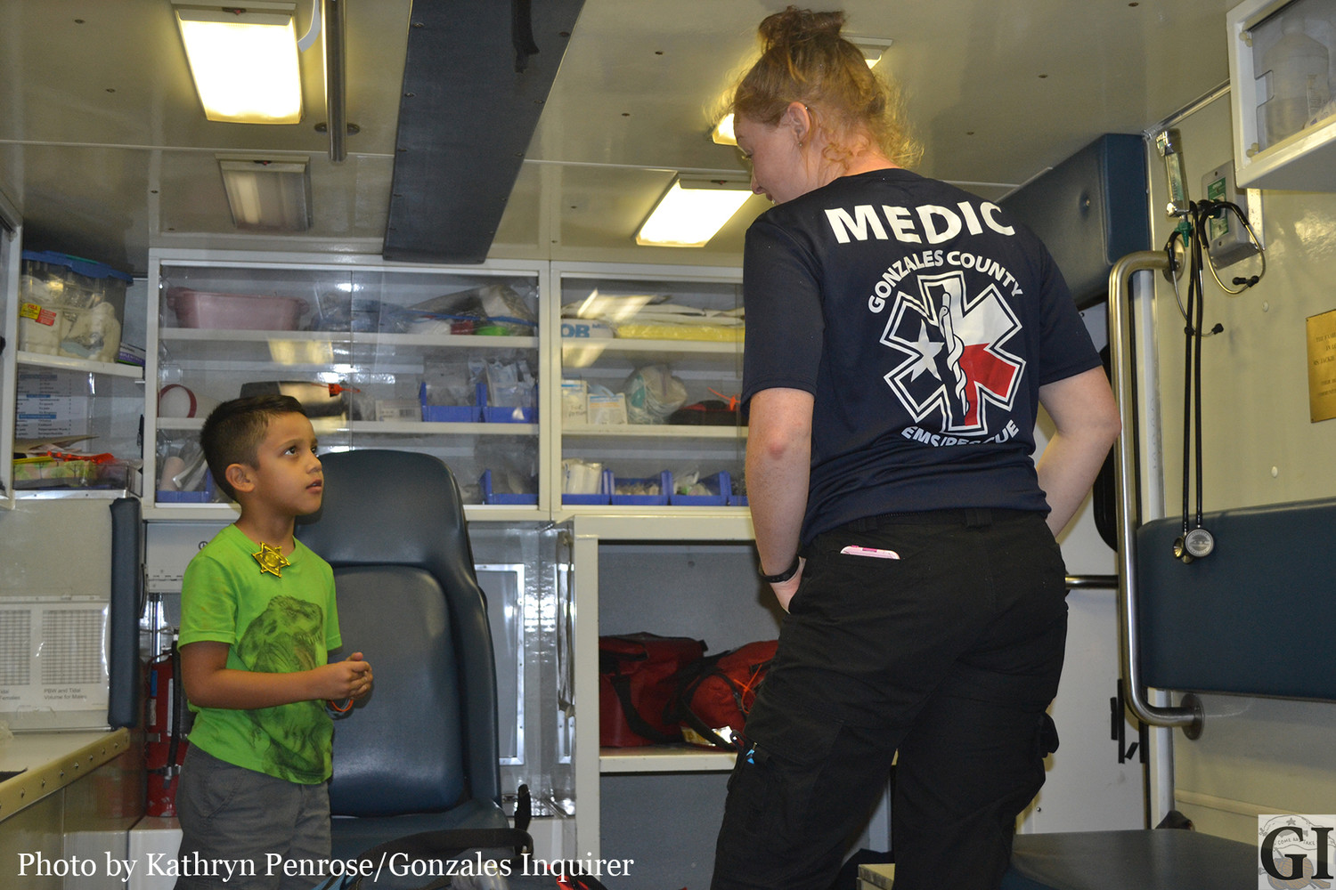 TJ Garza got a tour of a Gonzales County Emergency Medical Services Rescue Unit, during National Night Out Tuesday night. EMT Christine Brown showed the inquisitive youngster the unit and talked to him about emergency services.
