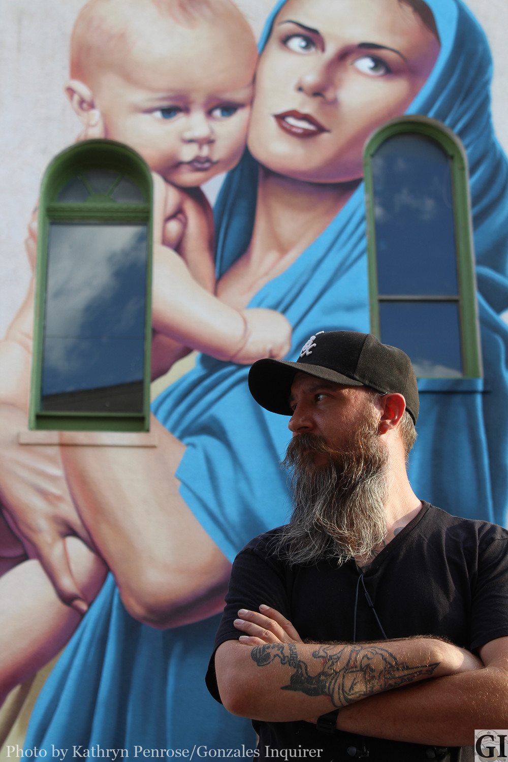 Artist Mez Data, pictured, spent five days painting this representation of Susanna Dickinson and her baby Angelina Elizabeth "Babe of The Alamo" Dickinson, on the Josephine Peck building, owned by Larry and Johnnie Edwards. The building is located on the Southwest corner of St. Joseph Street and St. George Street.