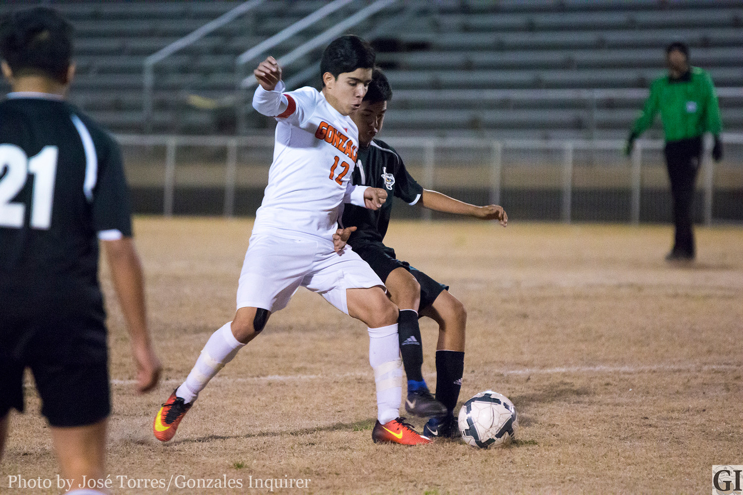 Suriel Rangel (12) fights for possession in Gonzales’ 2-1 win over Sealy in a non-district game on Monday. Rangel scored both goals in the victory.