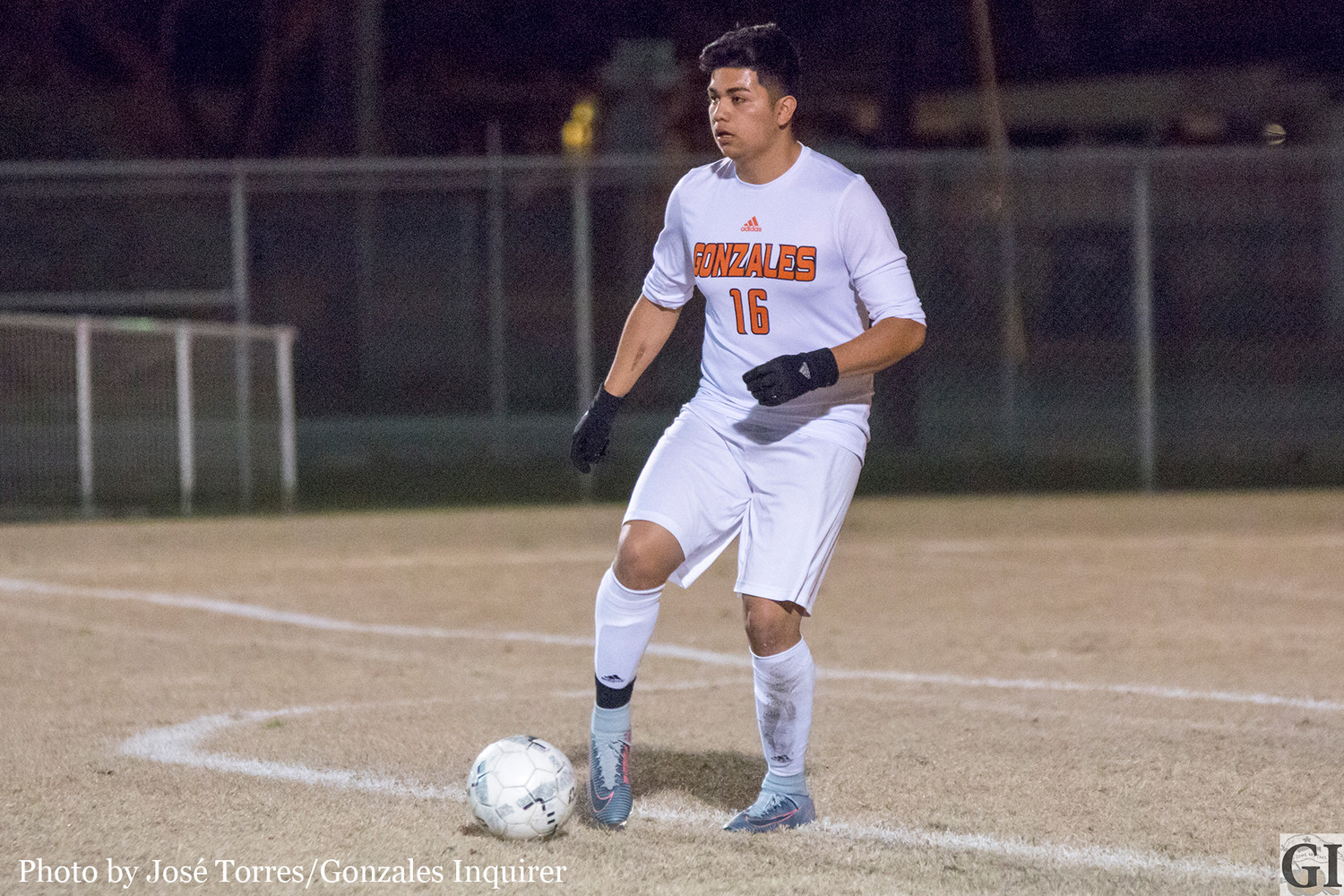 Julian Matamoros (16) clears the ball from the back four.