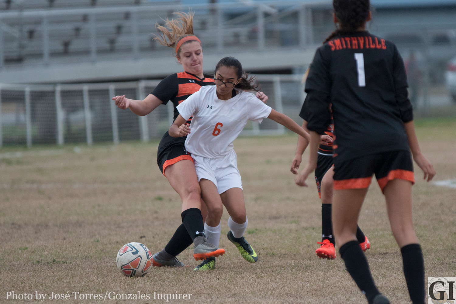 Samantha Gallegos fights for the ball.