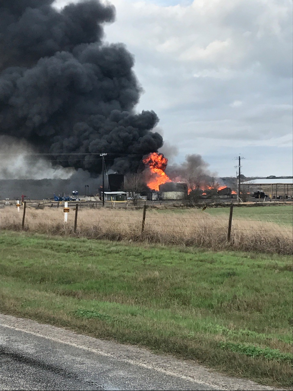 Fire blazes and smoke billows after a lightning strike caused an explosion at an oil storage facility at FM 1116 and CR 206 in southern Gonzales County at 7:30 a.m., on Sunday, Feb. 25. No one was injured in the explosion.