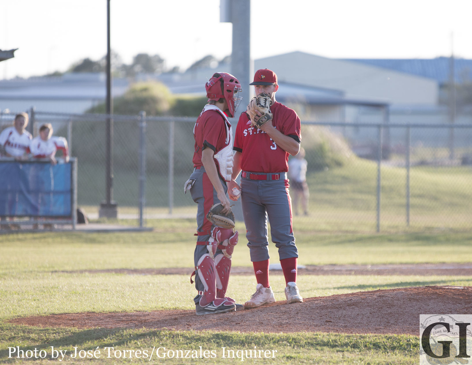 Conor Kresta meets with his catcher in the Cardinals’ 5-0 loss.