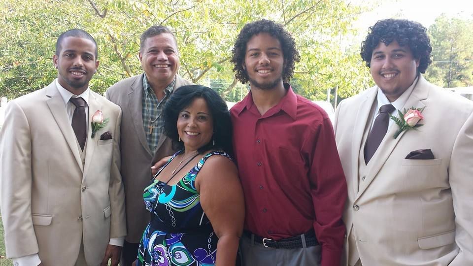 The Torres family (from left), Joshuamil (middle brother), Julio (dad), Lucille (mom), Omar (youngest) and José (oldest).