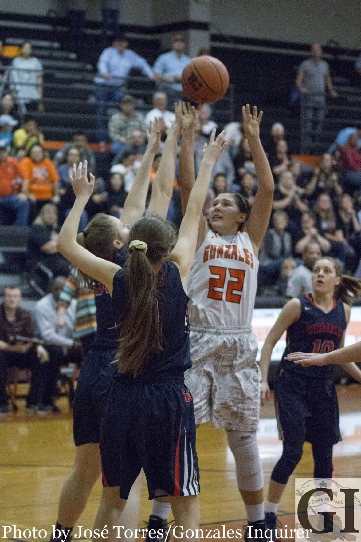 The Lady Apaches attacked the post game as senior Amanda Dixson (22) puts up a shot during Gonzales' 70-53 win over Wimberley. Dixson ended the night with eight points, four rebounds and an assist.