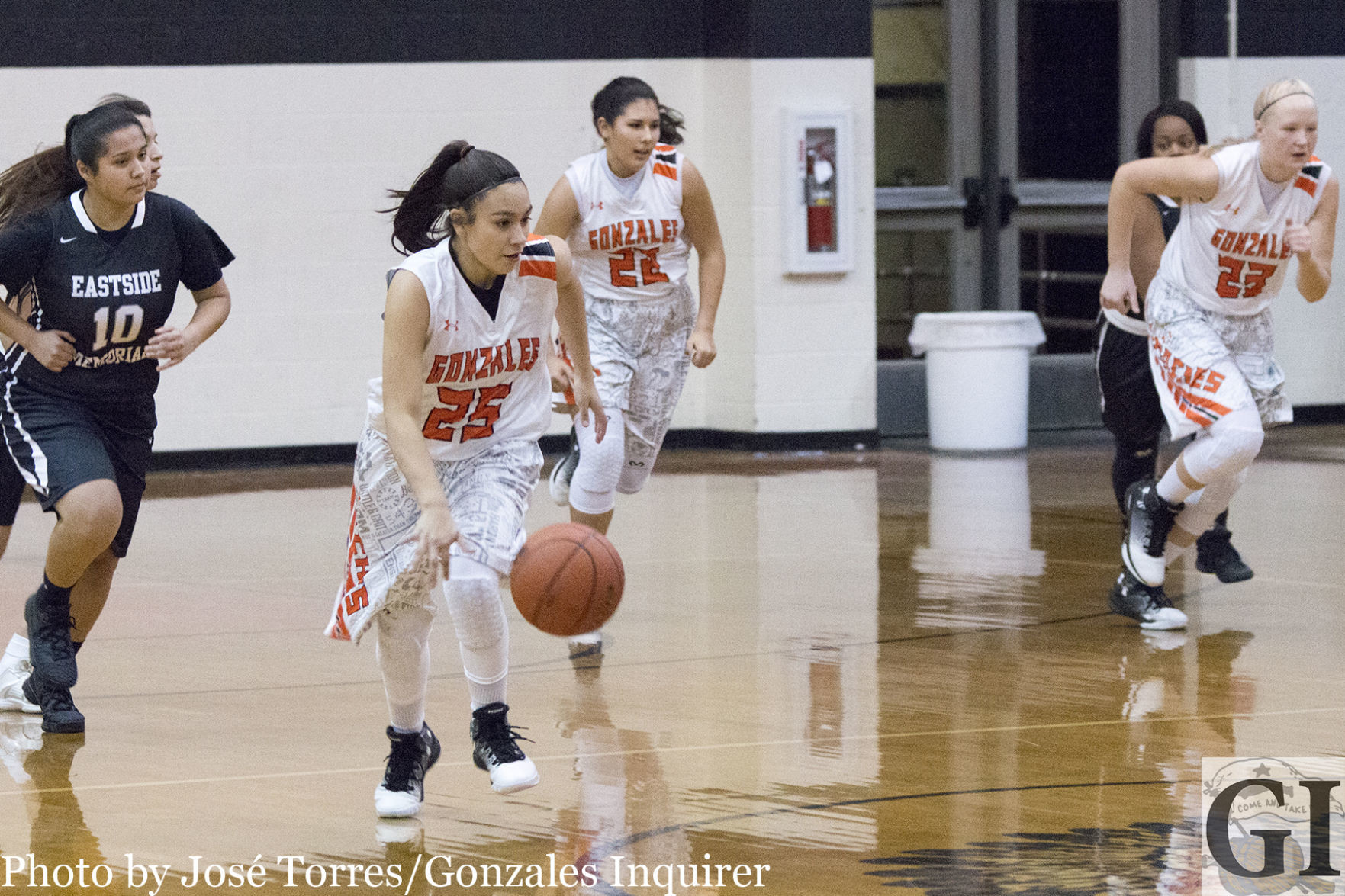 Freshman point guard Jiseala Longoria (25) drives down the court looking for a basket after a turnover. She finished the night with six points in Gonzales’ 70-35 win over Austin Eastside Memorial.