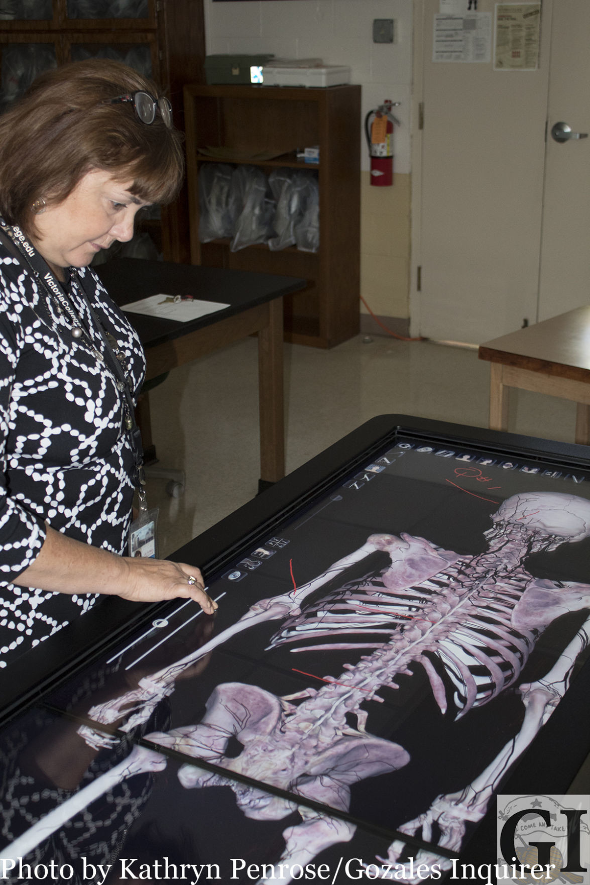 Jackie Mikesh, manager of Victoria College Gonzales Center, shows the operation of the center's Anatomage Table, used in Anatomy classes, to allow students to see 3D images of the human body and all its systems. The table was donated but the MG and Lillie A. Johnson Foundation.