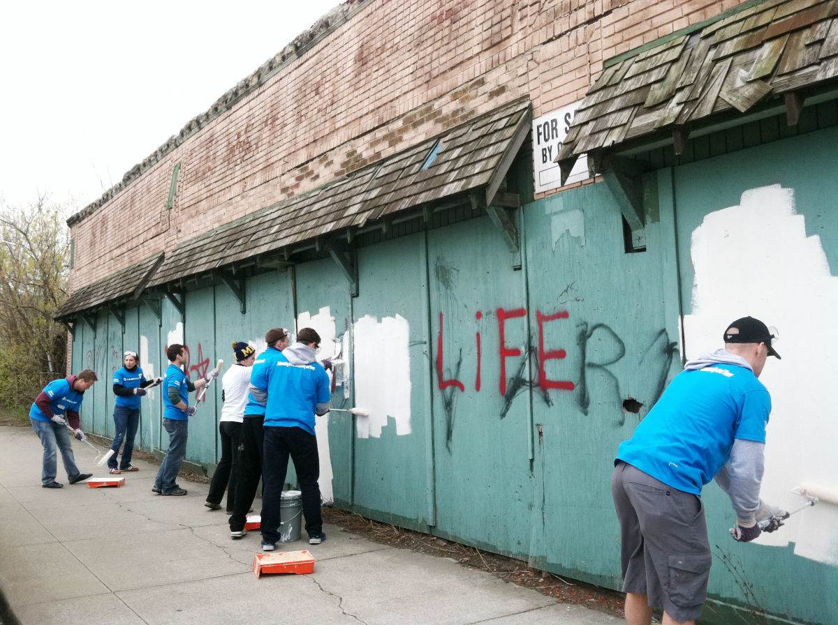 While in Detroit, the students helped with several blight projects such as painting over graffiti and dilapidated building fronts.