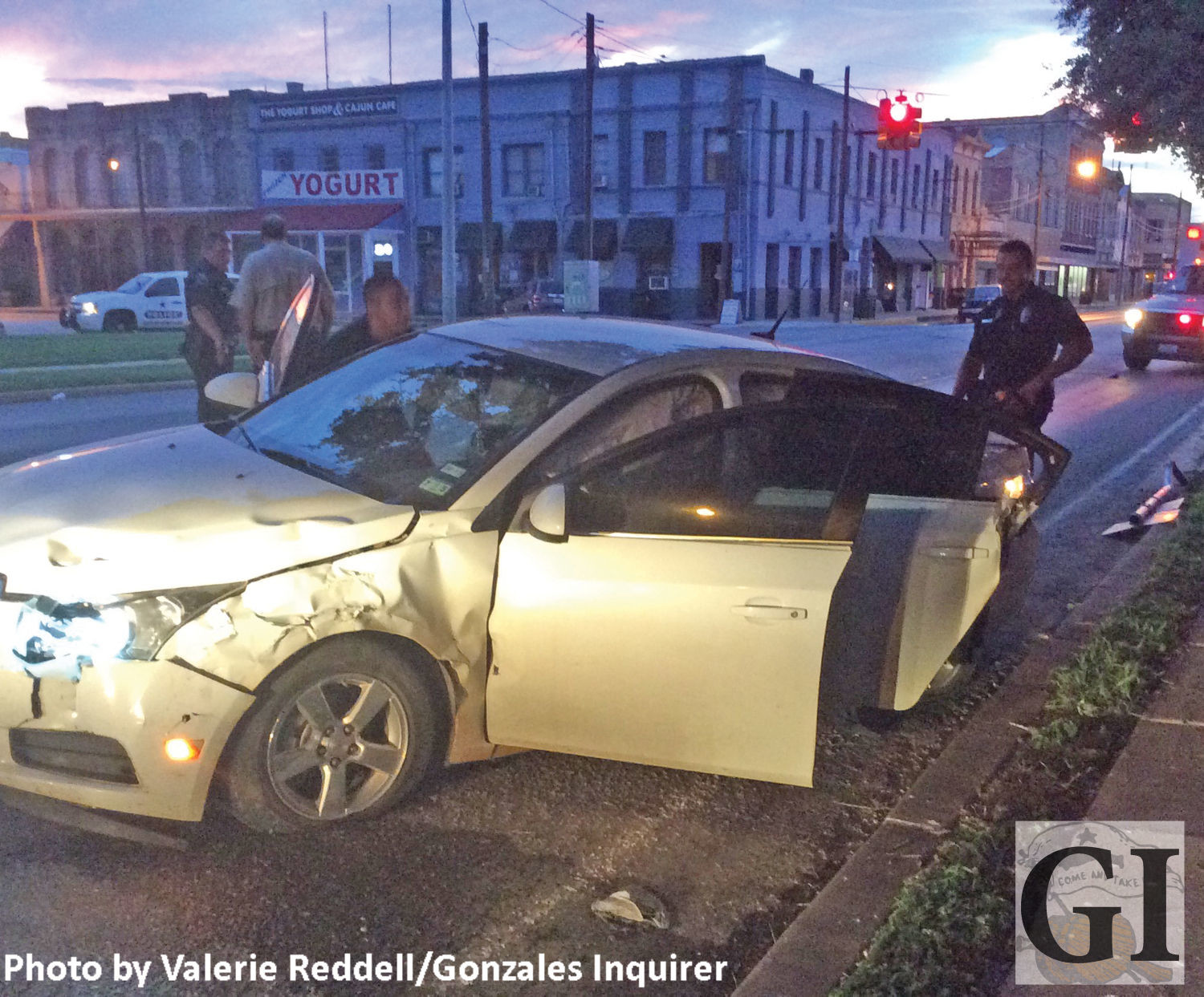 Officers said Augustine Martinez, the driver of this white Chevy, was at fault for failing to yield to the right of way of the ambulance. At the time, no citation had been written.